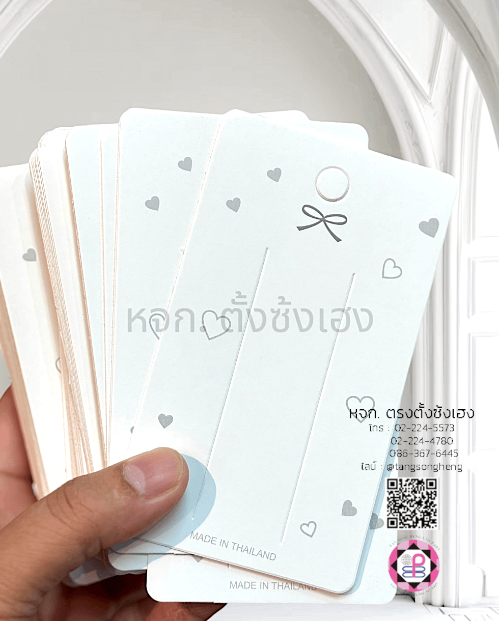 แผงกิ๊บทรงยาวพิมพ์รูปโบว์ สีขาว